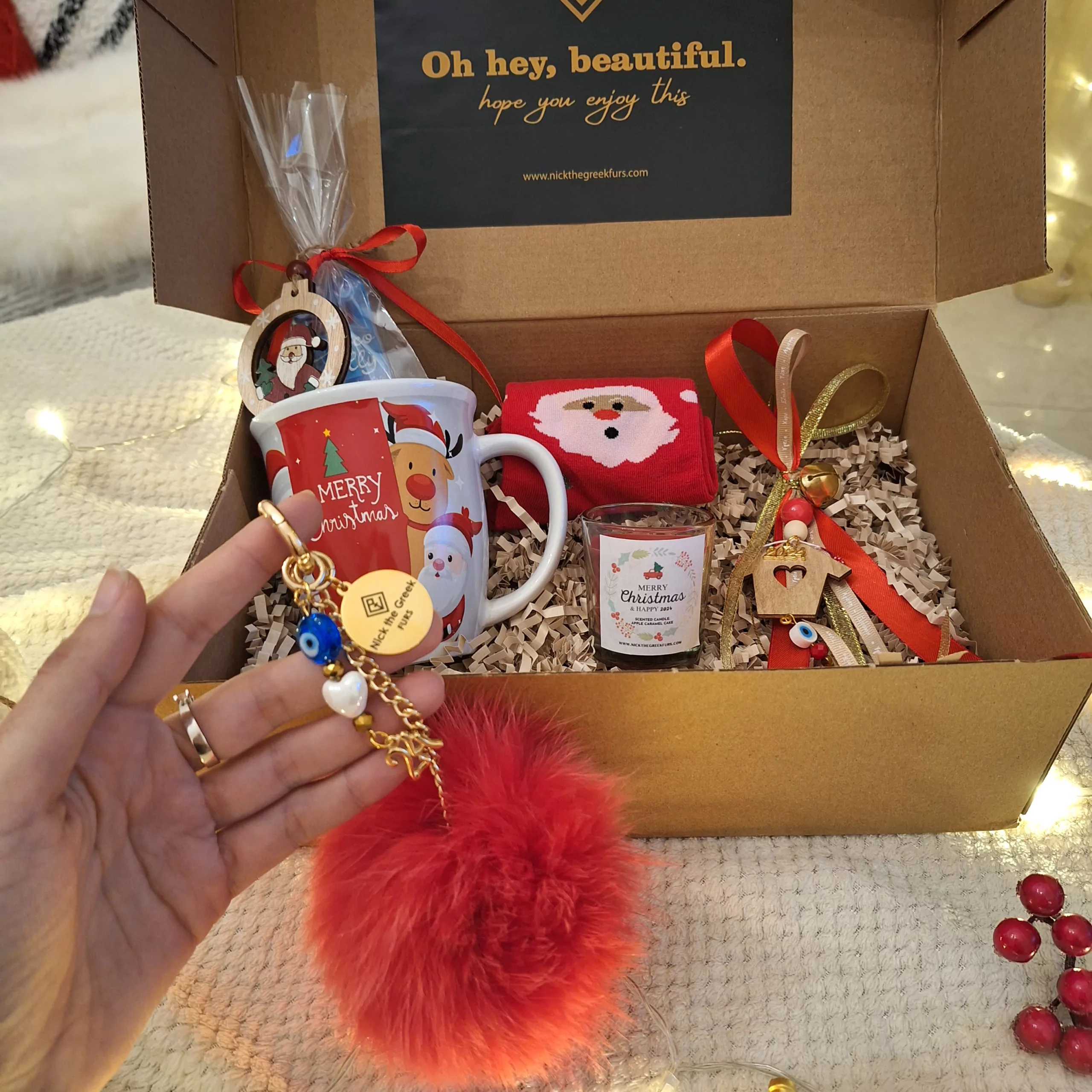 xmas gift box with pompom lucky charm