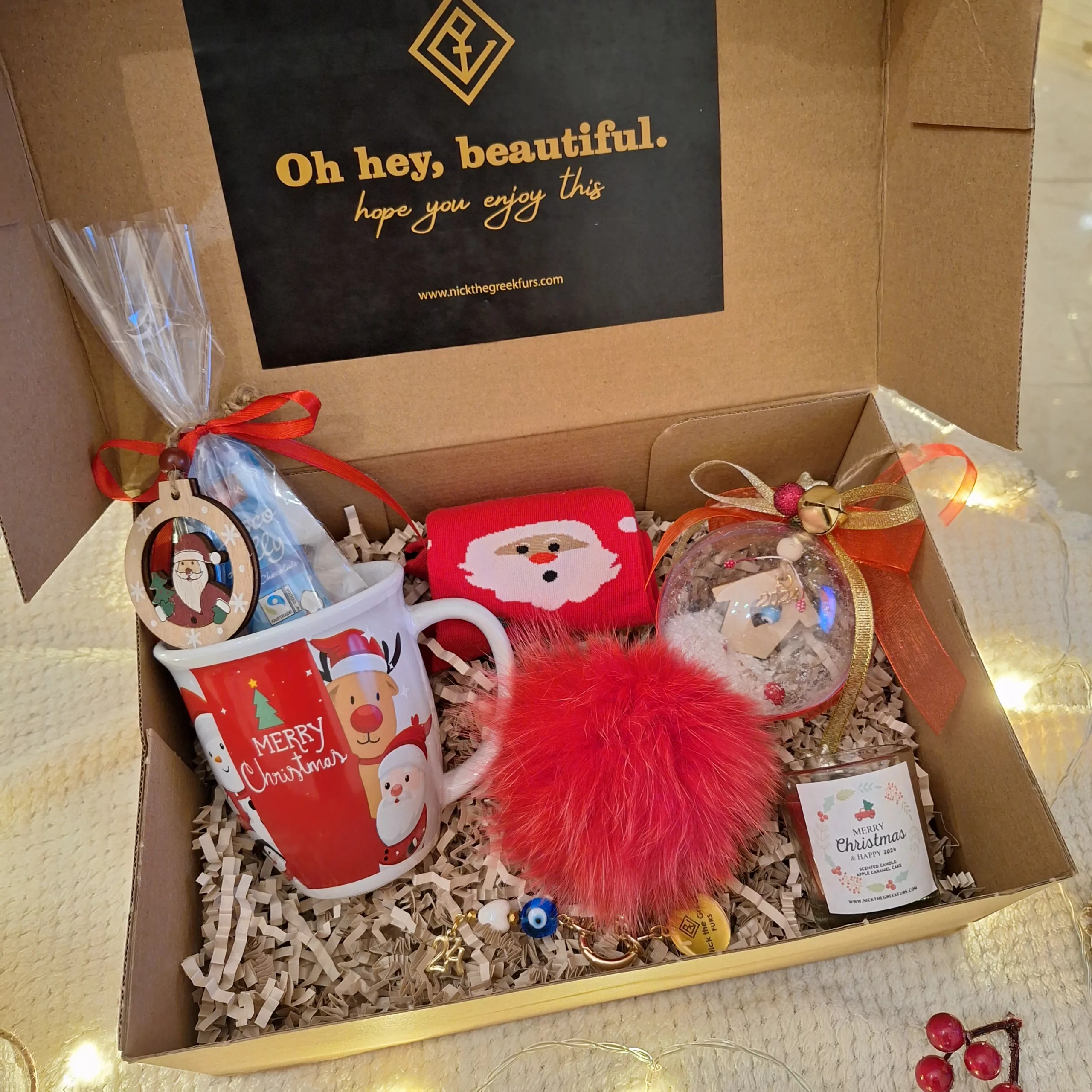 xmas gift box with pompom lucky charm